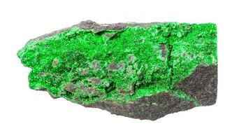 crystals of Uvarovite green garnet on rock photo