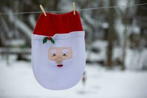 Santa's Christmas bag is dried on a rope. photo