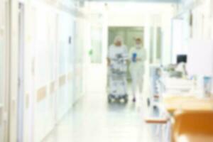 Blurred light background of a hospital corridor. photo