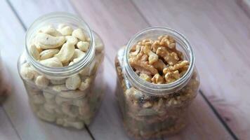 a close up of three jars of nuts video