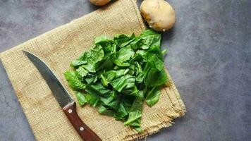 spinach and potatoes on a cloth on a table video