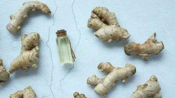 ginger root and oil on a white surface video