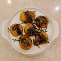 Gourmet Delight, Tempting Takoyaki on a White Plate photo