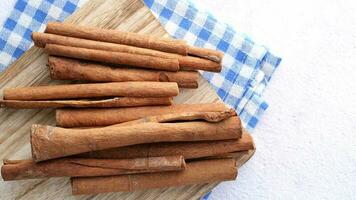 cinnamon sticks on a wooden cutting board video