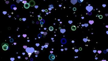 Particle heart and bubble floating to the top and zoom out on the black screen video