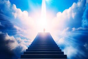 Man standing on top of stairway leading to star of light. photo