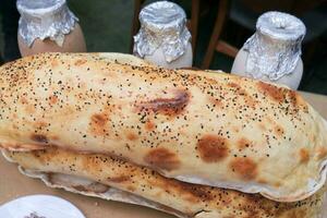 homemade roti chapati on table . photo