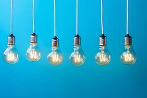 Row of light bulbs with the letter w in the middle of them. photo
