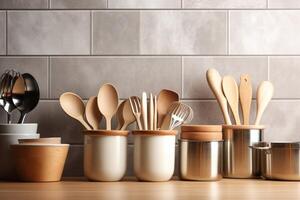 Crockery, tableware, utensils and other different stuff on wooden table-top. Kitchen still life as background for design. photo