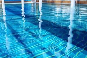swimming pool rippled water detail photo