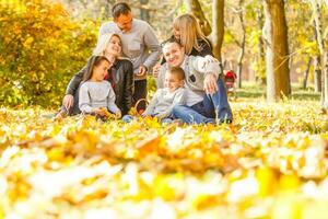 Happy Family in Autumn Park. Picnic photo