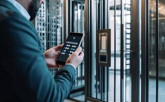 Locking smartlock on the entrance door using a smart phone remotely. Concept of using smart electronic locks with keyless access photo