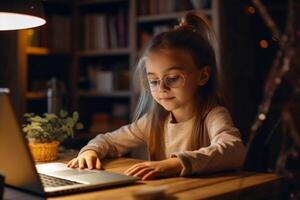 Distant Education. Adorable Little Girl In Headphones Using Laptop In Kitchen, Sitting At Table And Showing Thumb Up At Camera, Female Child Study Online With Computer photo