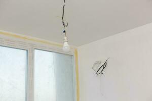 repair, renovation, electricity and people concept - close up of electrician photo