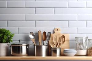 Crockery, tableware, utensils and other different stuff on wooden table-top. Kitchen still life as background for design. photo