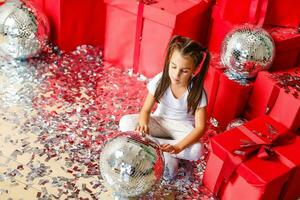 Smiling baby girl. Pajamas party. Childhood. Playful. photo