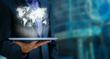 Businessman using tablet analyzing sales data and economic growth graph chart, Technology and icon customer global network connection. Business strategy. Innovative. Digital marketing photo