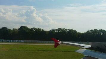 View from the window, the plane brakes after landing. Airliner flaps extended video