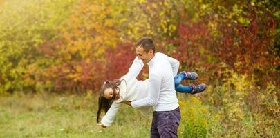 happy father and daughter on natural background photo