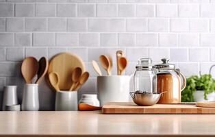 Crockery, tableware, utensils and other different stuff on wooden table-top. Kitchen still life as background for design. photo