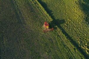 Harvester in Pampas Countryside, aerial view, La Pampa province, Argentina. photo