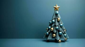 Creative art style christmas tree on a blue background minimalism photo