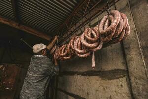 Handmade sausage preparation, Argentine tradition, Pampas, Patagonia photo