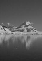 Paraiso Bay mountains landscape, Antartic Pennsula. photo