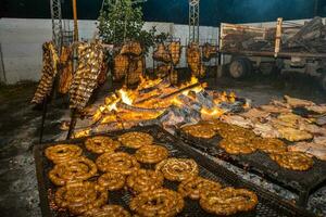 Barbecue, sausage and cow ribs, traditional argentine cuisine photo