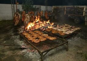Barbecue, sausage and cow ribs, traditional argentine cuisine photo