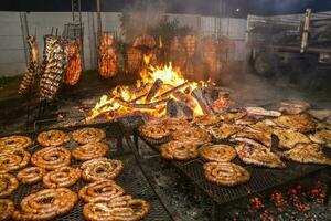 Barbecue, sausage and cow ribs, typical argentinean food photo