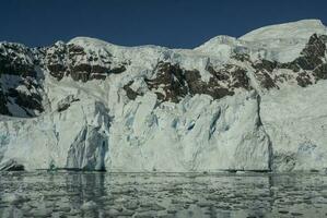 Paradise bay glaciers and mountains, Antartic peninsula, Antartica.. photo