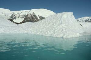 Paradise bay glaciers and mountains, Antartic peninsula, Antartica.. photo