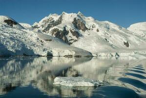 Paradise bay glaciers and mountains, Antartic peninsula, Antartica.. photo