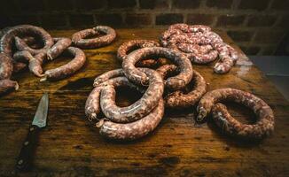 Handmade sausage preparation, Argentine tradition, Pampas, Patagonia photo