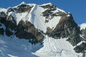 Glaciers and mountains in Paradise bay, Antarctic peninsula, Antartica.. photo