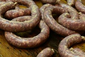 hecho a mano salchicha preparación, argentino tradición, pampa, Patagonia foto