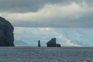 Coastal volcanic landscape, Deception Island, Antrtica photo