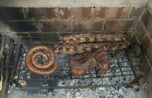 Ribs, roast beef and chorizos photo
