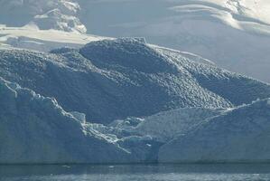 Paradise bay glaciers and mountains, Antartic peninsula, Antartica.. photo