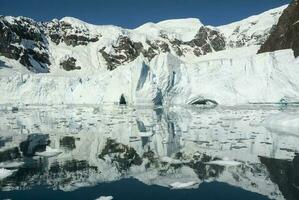 Paradise bay glaciers and mountains, Antartic peninsula, Antartica.. photo