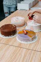 Cooking mousse cake at a cooking class. Cooking at home, home-made food. Confectioner. photo