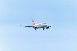 Airplane from EasyJet landing at Schiphol AirPort. Amsterdam Netherlands April 15 2023. photo