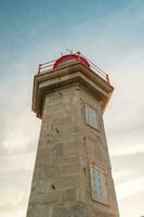 Farolim de Felgueiras, lighthouse with sunset. Porto Portugal Juli 5 2023. photo