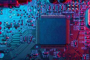 Digital Microprocessor. Computer Controller Circuit Board closeup Main Central Processing Unit Electronic Chips with Data Signal Lane. photo