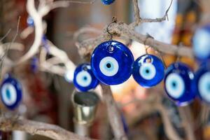 The Blue Turkish Evil Eye Nazar Amulet or Nazar Boncugu blue sapphire charm souvenir from Turkey photo