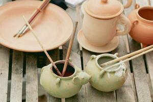 Pottery painting tools for paint decoration arts line colors pattern on earthenware process photo