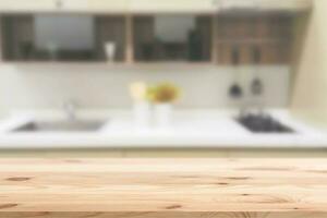 Blur sink counter space in modern home kitchen with wooden foreground for advertising montage background photo