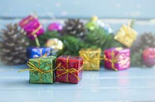 colorful christmas presents on a wooden bench photo