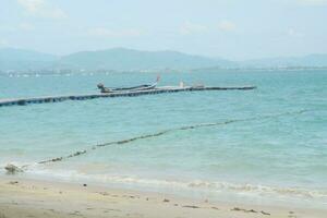 fishing boat on the sea Beach sky photo